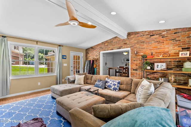 3711 Quail Hollow Ct, Louisville, KY 40241 - living area featuring wood finished floors, ceiling fan, baseboards, and brick wall