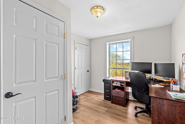 224 Murphy Ln, Bloomfield, KY 40008 - office space featuring light wood-type flooring, baseboards, and a textured ceiling