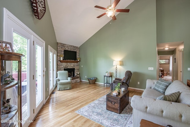 79 Ivy Ct, Brandenburg, KY 40108 - living area with high vaulted ceiling, ceiling fan, wood finished floors, and a fireplace