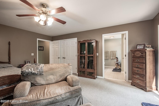 79 Ivy Ct, Brandenburg, KY 40108 - carpeted bedroom featuring a closet, ensuite bath, baseboards, and a ceiling fan