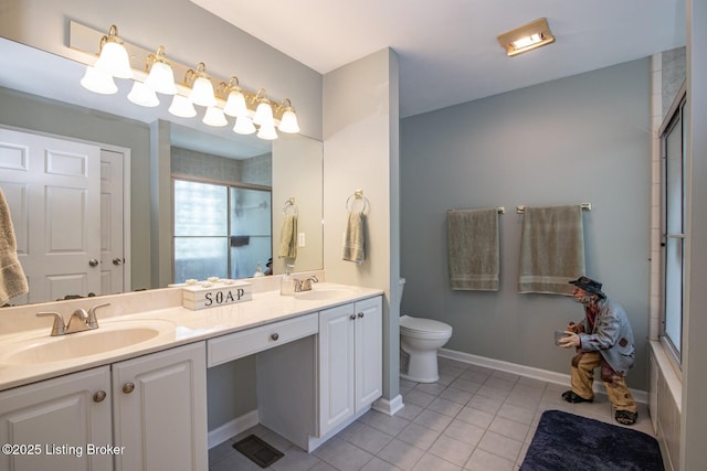 79 Ivy Ct, Brandenburg, KY 40108 - bathroom featuring tile patterned floors, an enclosed shower, toilet, double vanity, and baseboards