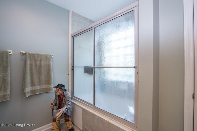 79 Ivy Ct, Brandenburg, KY 40108 - bathroom with tiled shower and plenty of natural light