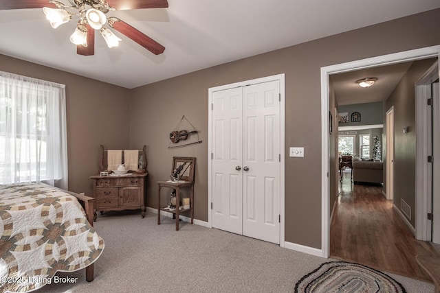 79 Ivy Ct, Brandenburg, KY 40108 - bedroom with a closet, baseboards, a ceiling fan, and carpet floors