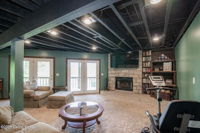 79 Ivy Ct, Brandenburg, KY 40108 - living room featuring french doors, carpet, and a fireplace