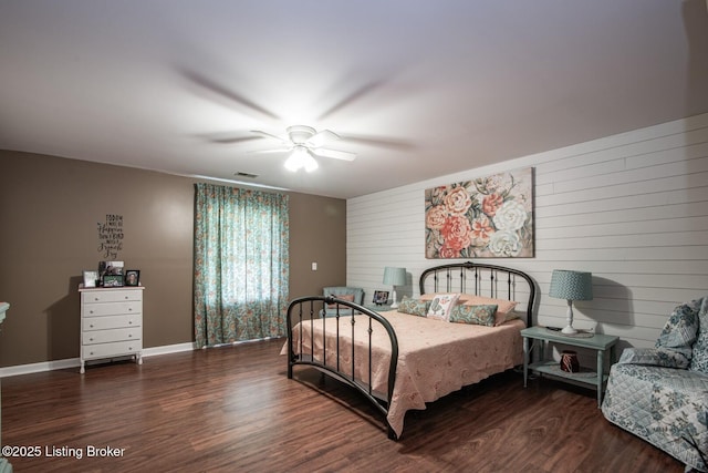 79 Ivy Ct, Brandenburg, KY 40108 - bedroom featuring wood finished floors, baseboards, wooden walls, and ceiling fan