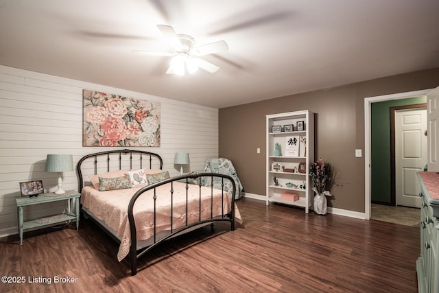 79 Ivy Ct, Brandenburg, KY 40108 - bedroom featuring wood finished floors, baseboards, wooden walls, and a ceiling fan
