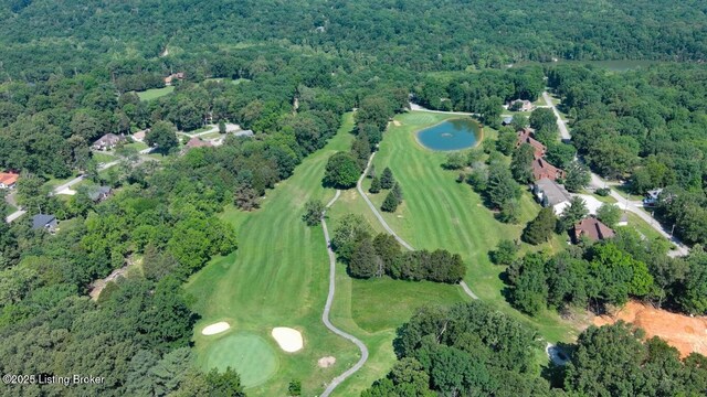 79 Ivy Ct, Brandenburg, KY 40108 - aerial view of property and surrounding area with a forest, a nearby body of water, and a golf course