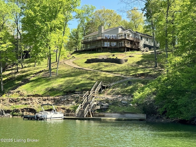 79 Ivy Ct, Brandenburg, KY 40108 - back of house featuring a deck with water view and a chimney