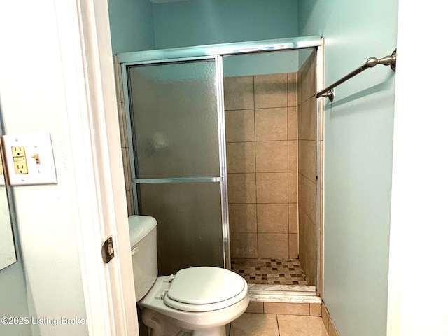 1513 La Fontenay Ct, Louisville, KY 40223 - bathroom featuring a shower stall, tile patterned flooring, and toilet