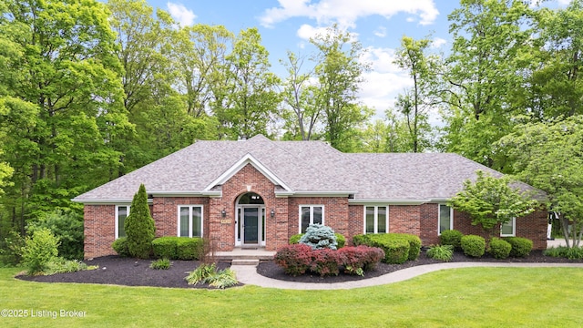 4424 Grand Cir, Crestwood, KY 40014 - view of front of property featuring brick siding, a front yard, and roof with shingles