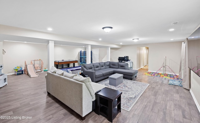 4424 Grand Cir, Crestwood, KY 40014 - living area featuring wood finished floors, recessed lighting, and baseboards