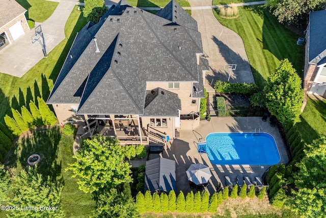 view from above of property with a pool area
