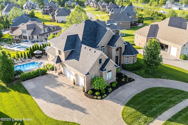 aerial perspective of suburban area with a pool area