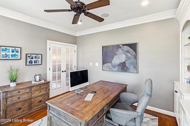office area featuring french doors, dark wood-style flooring, crown molding, a ceiling fan, and baseboards