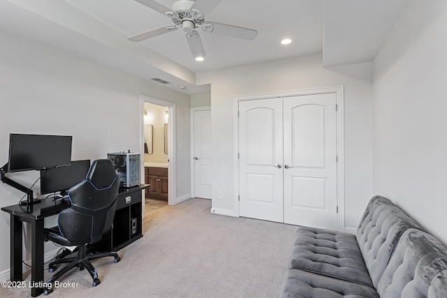office space featuring ceiling fan, light carpet, baseboards, and recessed lighting