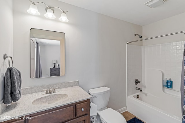 full bath featuring toilet, vanity, and shower / bath combo with shower curtain