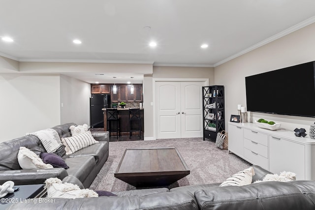 living area featuring crown molding, light carpet, and recessed lighting
