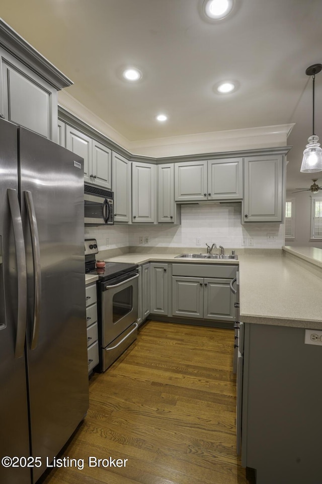 895 Woodlawn Rd Unit 2, Bardstown, KY 40004 - kitchen with appliances with stainless steel finishes, gray cabinetry, a sink, light countertops, and crown molding