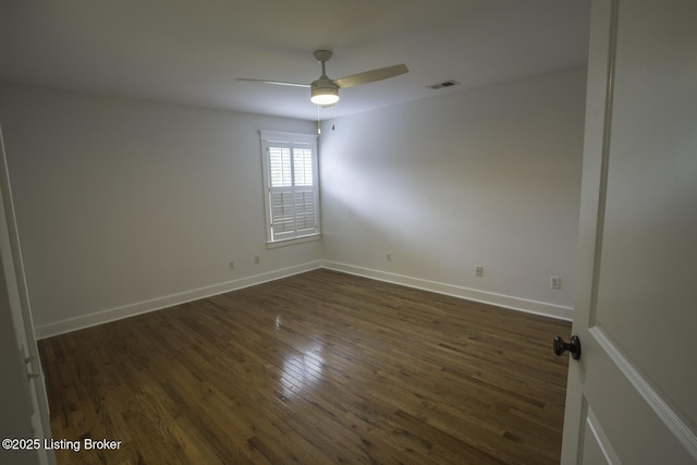 895 Woodlawn Rd Unit 2, Bardstown, KY 40004 - empty room featuring dark wood-style flooring, a ceiling fan, and baseboards