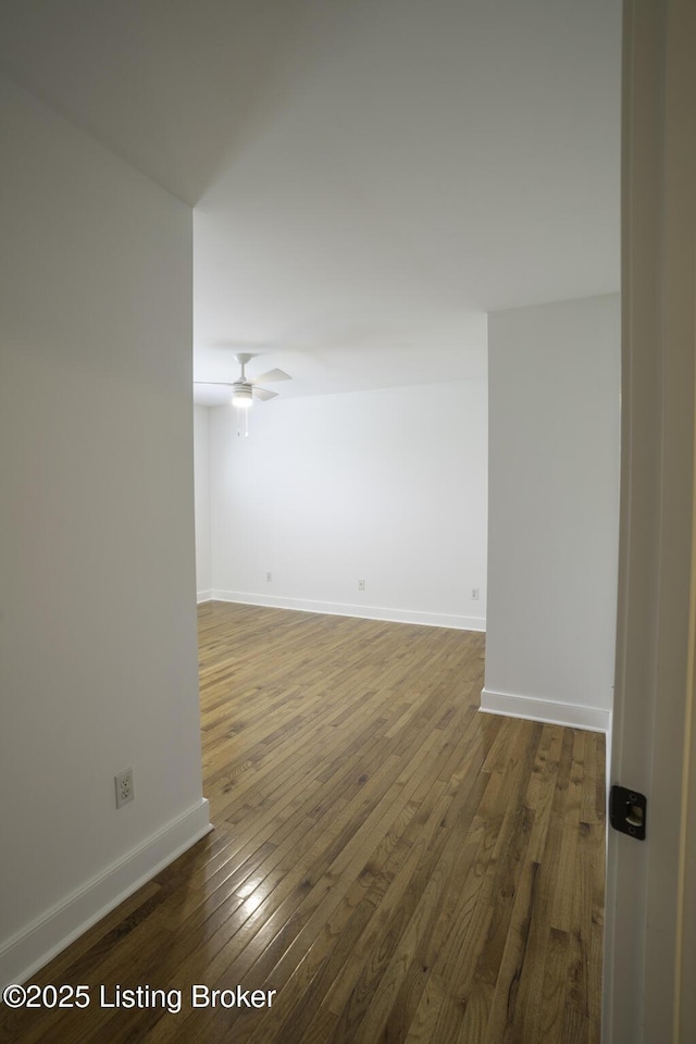895 Woodlawn Rd Unit 2, Bardstown, KY 40004 - empty room featuring dark wood-style flooring, baseboards, and a ceiling fan