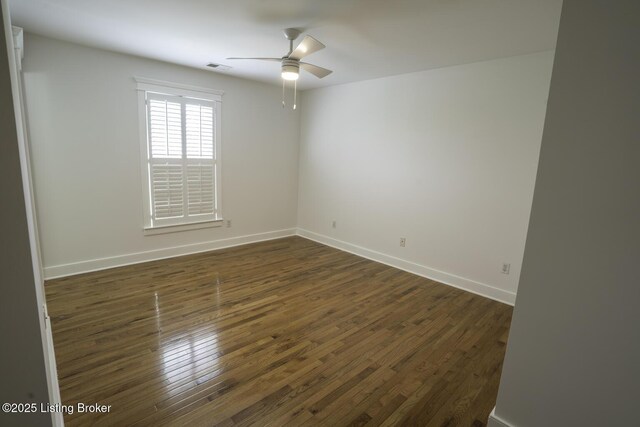 895 Woodlawn Rd Unit 2, Bardstown, KY 40004 - spare room with dark wood finished floors, ceiling fan, and baseboards