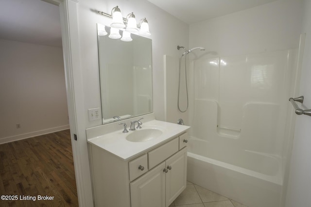 895 Woodlawn Rd Unit 2, Bardstown, KY 40004 - full bath featuring vanity, shower / washtub combination, wood finished floors, and baseboards