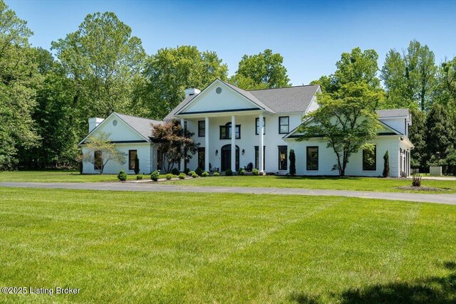 11308 Bodley Dr, Louisville, KY 40223 - neoclassical / greek revival house featuring a front yard and a chimney