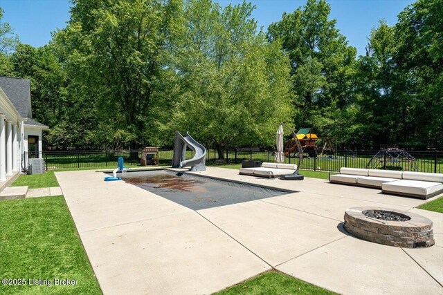 11308 Bodley Dr, Louisville, KY 40223 - view of patio featuring a playground, view of scattered trees, and an outdoor living space with a fire pit