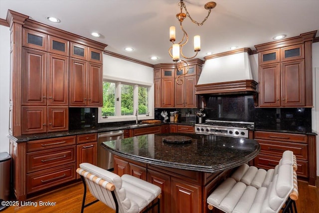 11308 Bodley Dr, Louisville, KY 40223 - kitchen featuring custom range hood, dishwasher, a kitchen breakfast bar, stove, and a sink