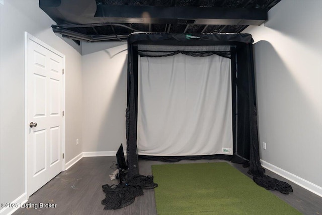 11308 Bodley Dr, Louisville, KY 40223 - basement with dark wood-type flooring, golf simulator, and baseboards
