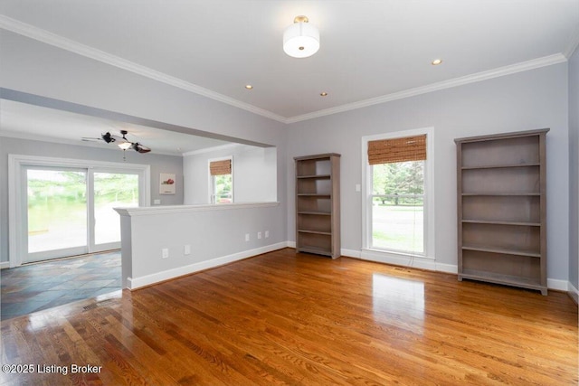 11308 Bodley Dr, Louisville, KY 40223 - unfurnished room featuring healthy amount of natural light, wood finished floors, baseboards, ornamental molding, and recessed lighting