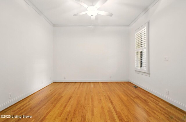 9144 Cranesbill Trce, Prospect, KY 40059 - spare room featuring light wood finished floors, a ceiling fan, crown molding, and baseboards