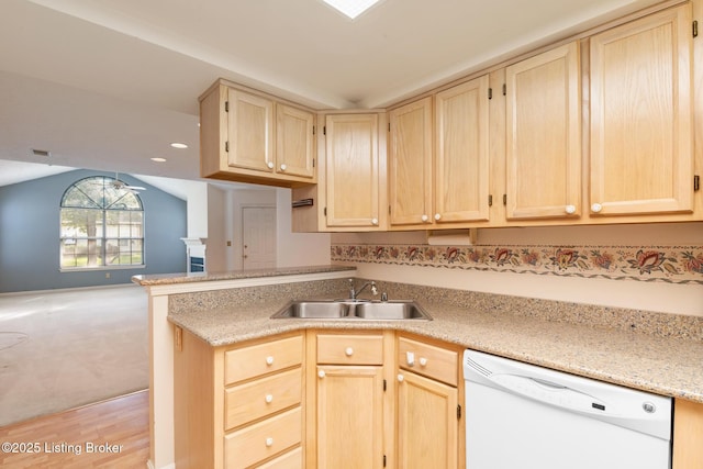 3010 Graystone Manor Pkwy, Louisville, KY 40241 - kitchen featuring white dishwasher, light brown cabinets, a sink, lofted ceiling, and open floor plan