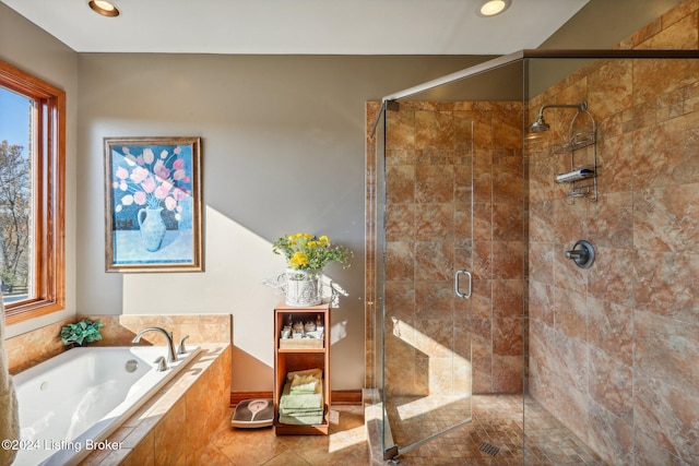 full bath with a garden tub, a shower stall, plenty of natural light, and recessed lighting