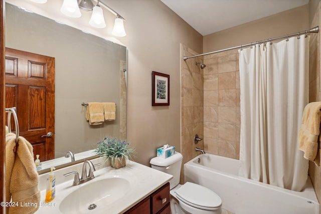 full bath with toilet, vanity, and shower / bath combination with curtain