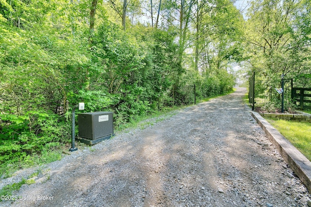 view of street with a gated entry