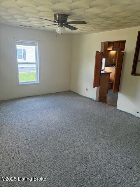 229 Beech Grove Rd, Shepherdsville, KY 40165 - spare room featuring light carpet and a ceiling fan