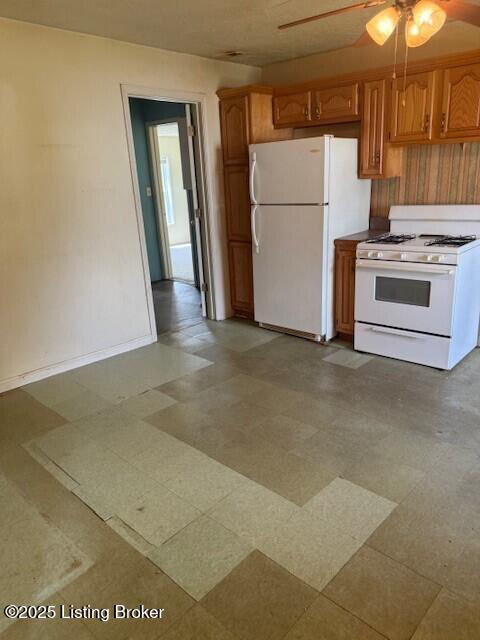 229 Beech Grove Rd, Shepherdsville, KY 40165 - kitchen with white appliances, ceiling fan, light flooring, and brown cabinetry