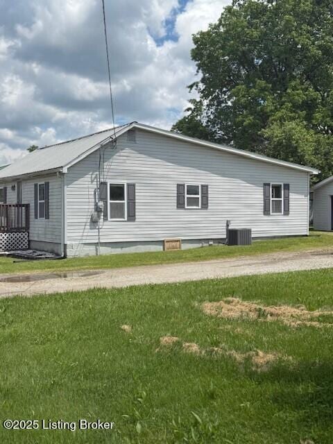 229 Beech Grove Rd, Shepherdsville, KY 40165 - view of property exterior with a lawn and cooling unit