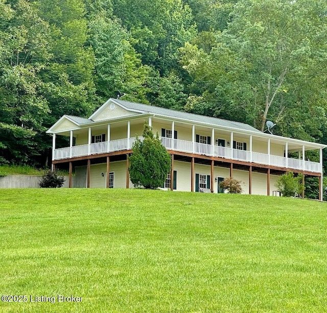 744 Bear Creek Rd, Leitchfield, KY 42754 - rear view of house with a yard and a forest view