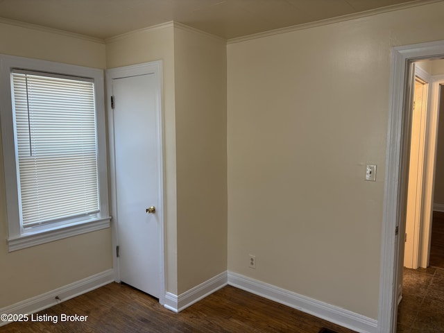 2809 Wyandotte Ave, Louisville, KY 40210 - spare room with baseboards, dark wood finished floors, and ornamental molding