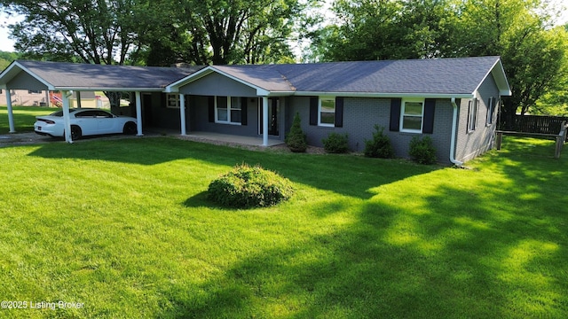 117 Northridge Dr, Bedford, KY 40006 - single story home featuring brick siding, an attached carport, and a shingled roof