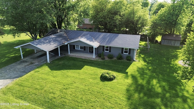 117 Northridge Dr, Bedford, KY 40006 - view of front of home featuring asphalt driveway, a front lawn, and a carport