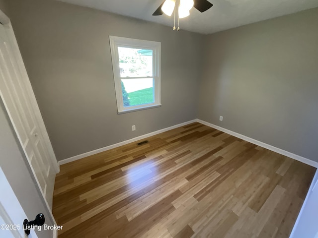 117 Northridge Dr, Bedford, KY 40006 - unfurnished room featuring baseboards, ceiling fan, and wood finished floors