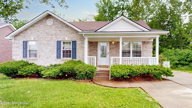 11404 Reality Trl, Louisville, KY 40229 - view of front of home with a porch, a front yard, and brick siding