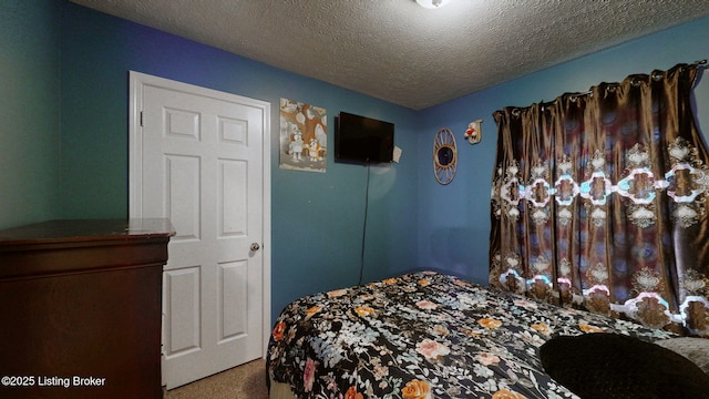 11404 Reality Trl, Louisville, KY 40229 - bedroom featuring carpet flooring and a textured ceiling