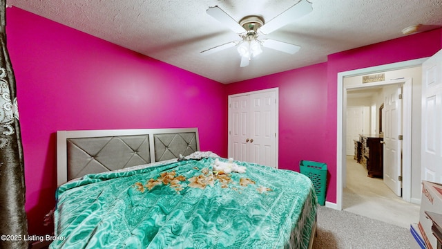 11404 Reality Trl, Louisville, KY 40229 - bedroom with carpet floors, a textured ceiling, ceiling fan, a closet, and baseboards