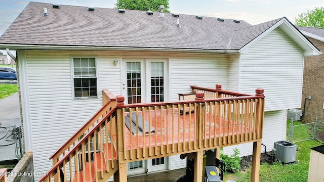 11404 Reality Trl, Louisville, KY 40229 - rear view of house with a wooden deck, a shingled roof, cooling unit, and stairway
