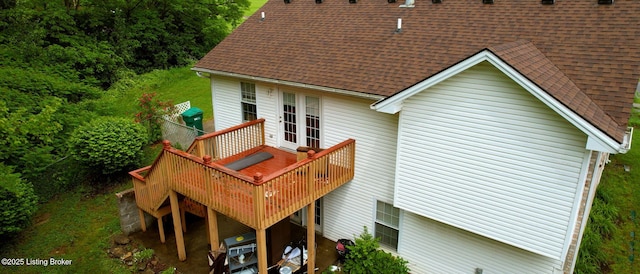 11404 Reality Trl, Louisville, KY 40229 - rear view of property featuring roof with shingles and a wooden deck