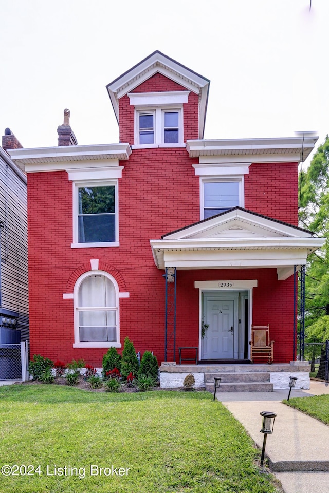 2935 S 3rd St, Louisville, KY 40208 - view of front of home with a front lawn and brick siding